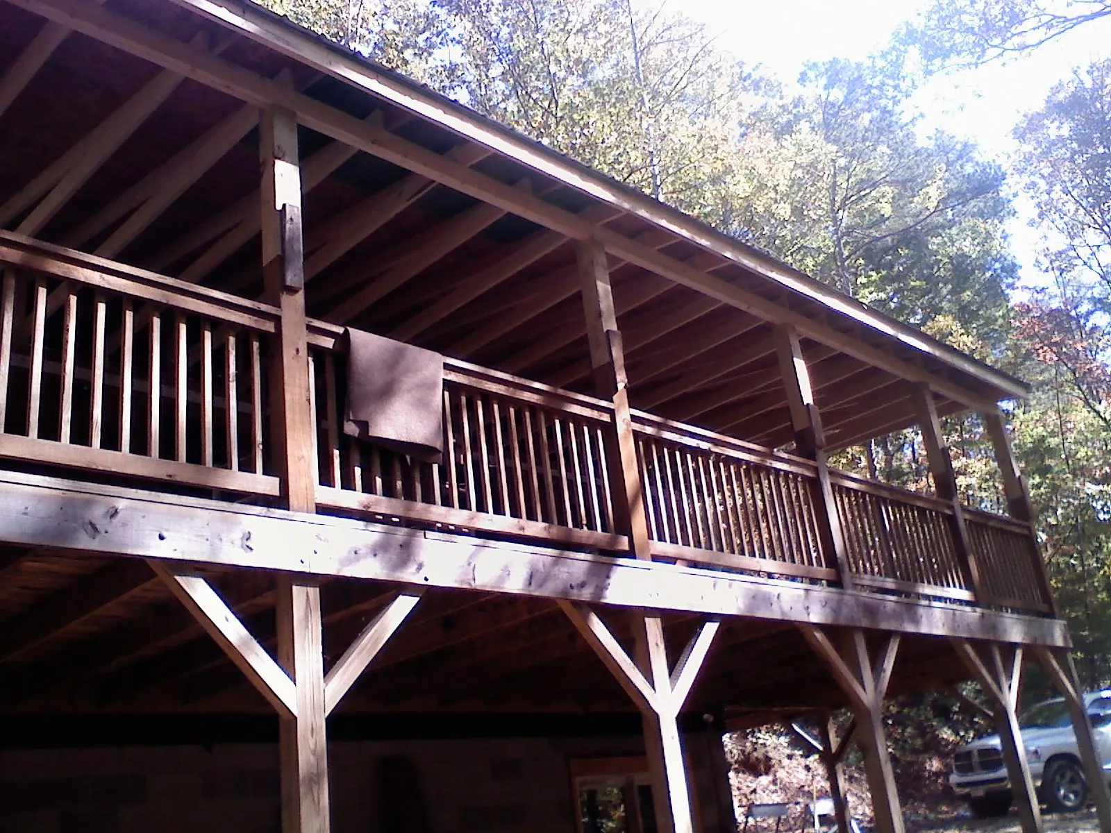 Timber framing under a new elevated porch and deck — Roof Leak Repair in Gulf Shores by Roofing Brothers